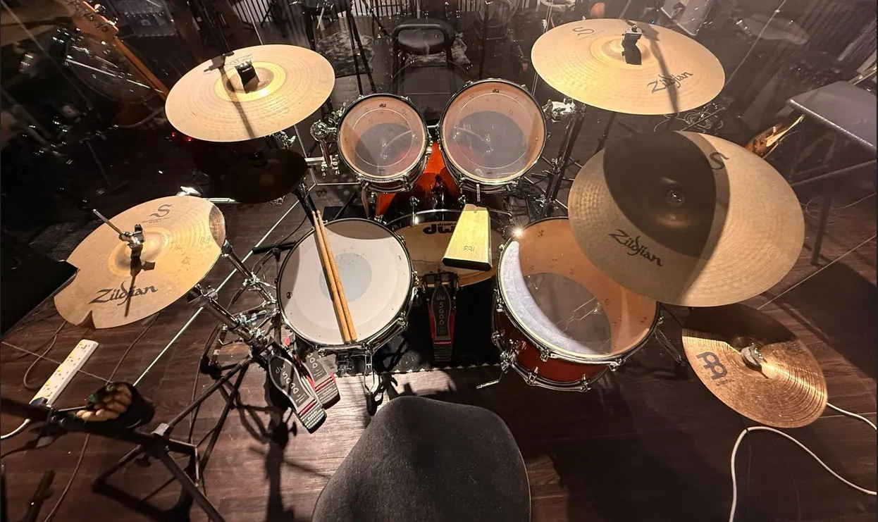 DW drum kit with Zildjian cymbals seen from the drummer's seat